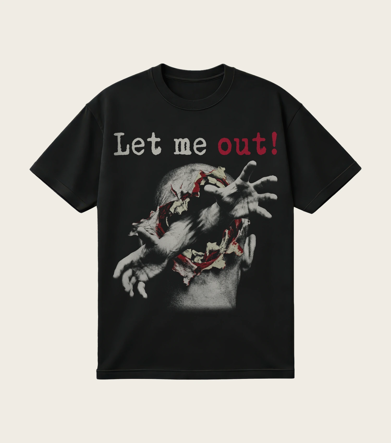 Let Me Out! printed on a black t-shirt, laid flat