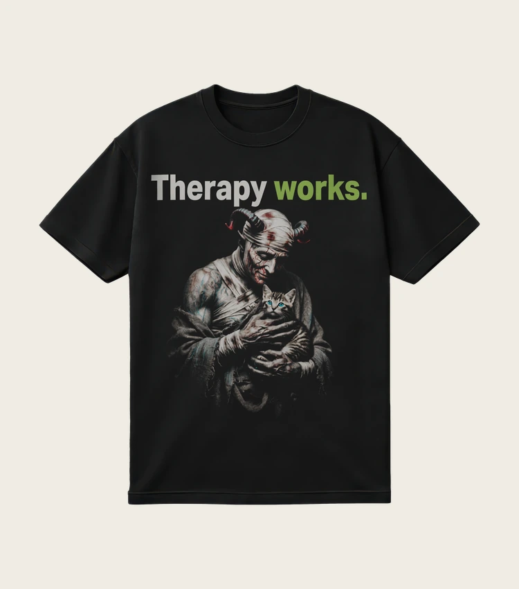 Therapy Works. printed on a black t-shirt, laid flat